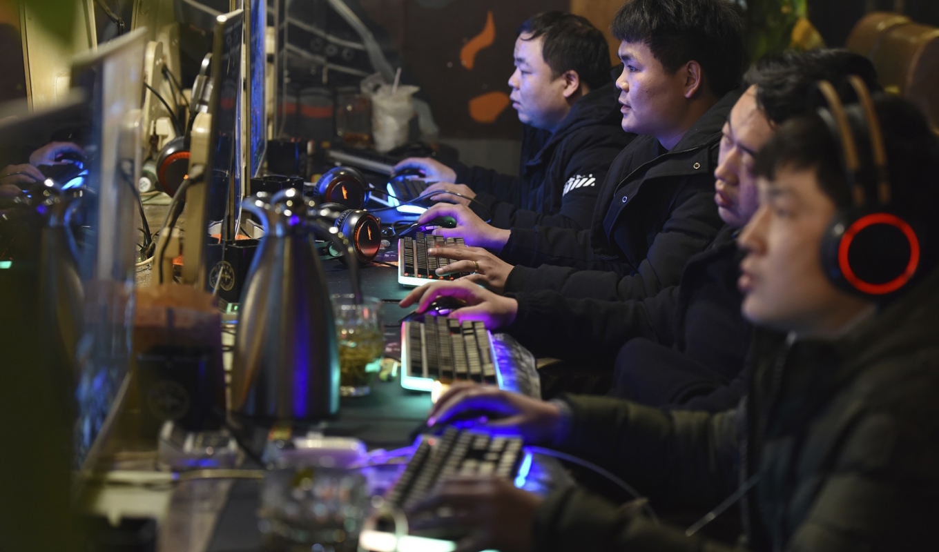 Fler än 668 miljoner kineser beräknas spela tv- eller dataspel regelbundet. Arkivbild. Foto: Chinatopix via AP/TT