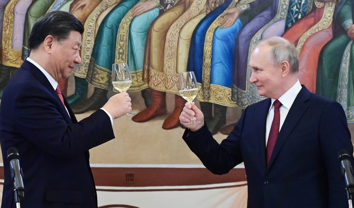 Xi Jinping och Vladimir Putin firar in det nya året med vänliga ord om ländernas stärkta relationer. Arkivbild. Foto: Pavel Byrkin/AP/TT