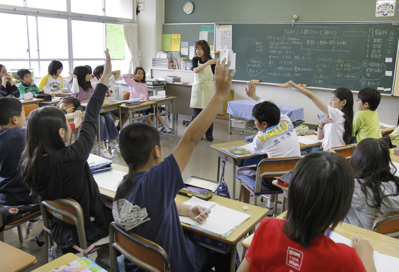 Lågstadieelever på en skola i Yokohama, söder om Tokyo. Arkivbild. Foto: Koji Sasahara/AP/TT