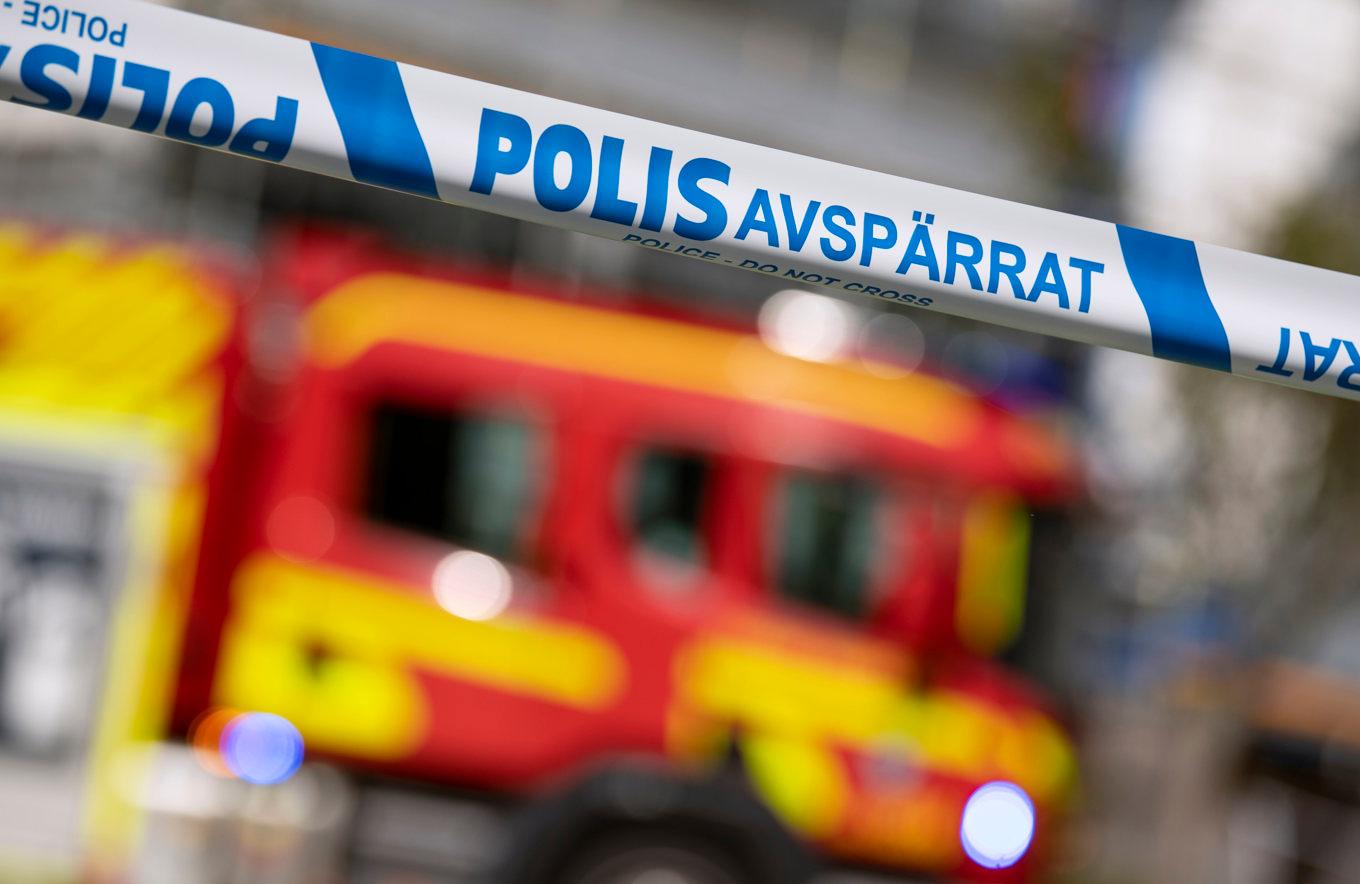 En fullt utvecklad brand rasar i ett lägenhetshus i Ängelholm. Arkivbild Foto: Johan Nilsson/TT