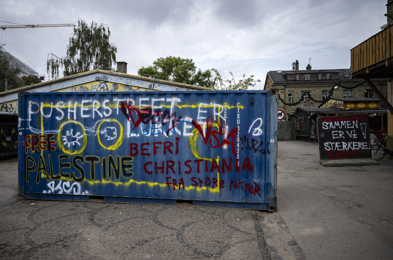 En nerklottrad container vid ingången till Pusher Street i fristaden Christiania i Köpenhamn i september 2023. Arkivbild. Foto: Johan Nilsson/TT