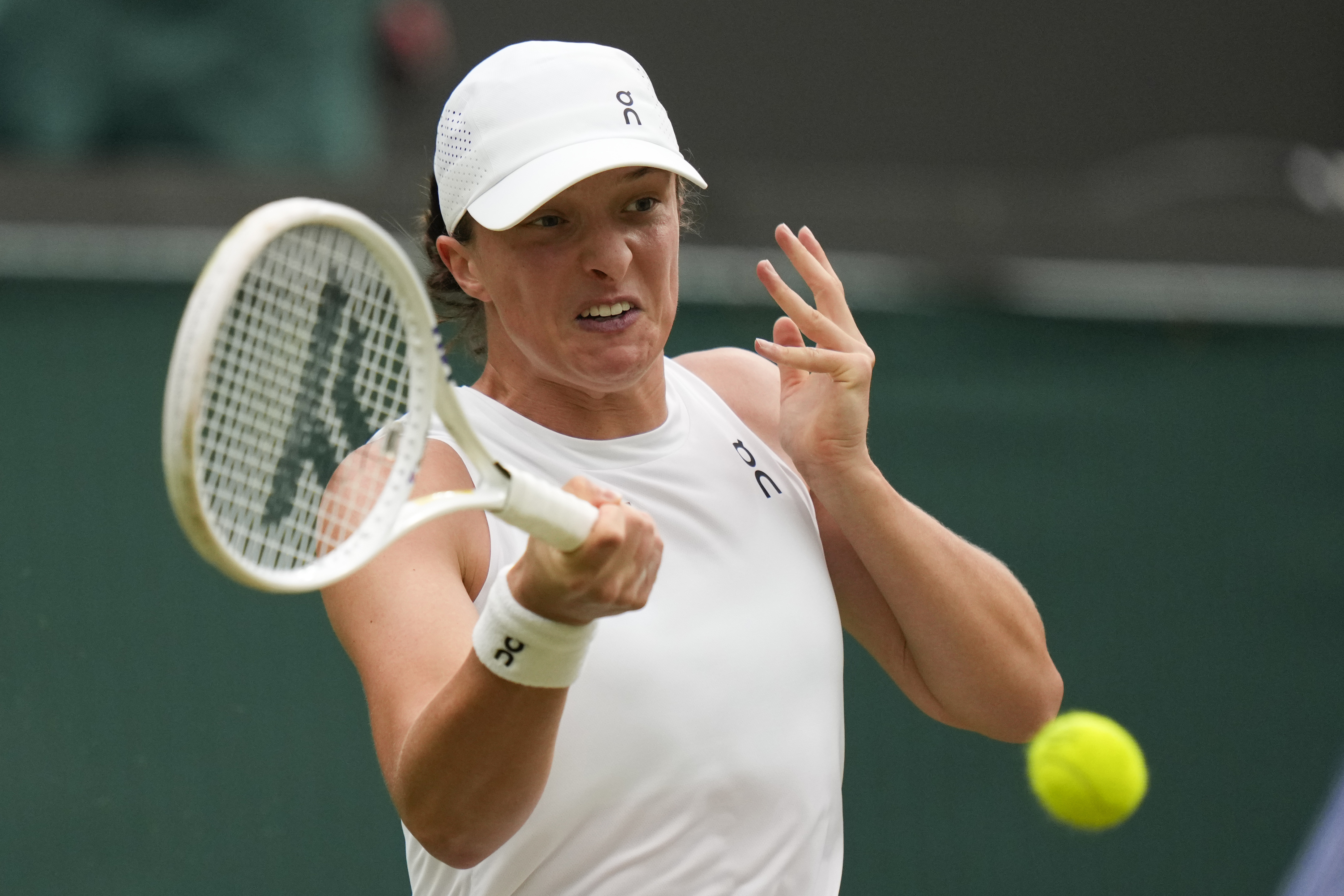 Iga Swiatek i Wimbledon-mötet med Yulia Putintseva. Foto: Alberto Pezzali/AP Photo/TT