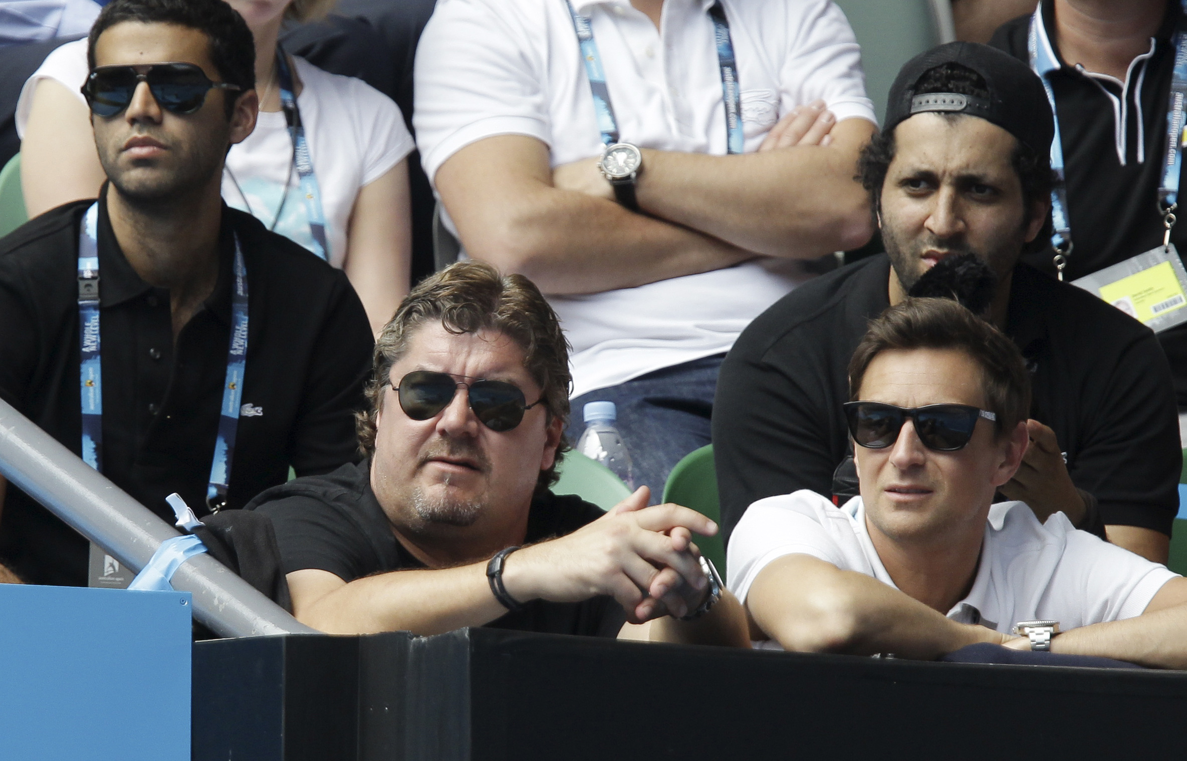 Peter Lundgren, ned till vänster under en match 2011 när han tränade schweizaren Stanislas Wawrinka. Foto: Shuji Kajiyama/AP/TT