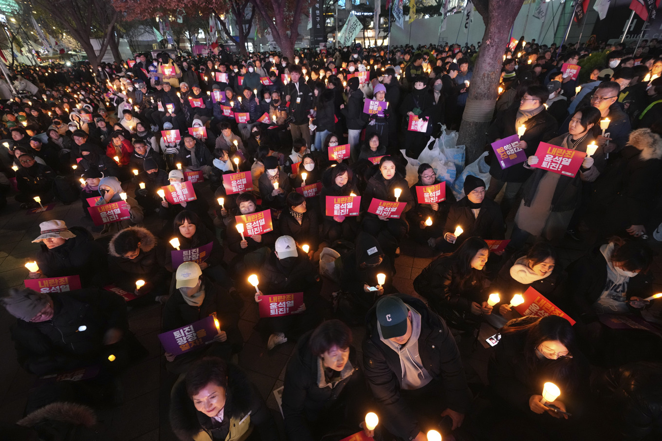 Protestmarsch mot presidenten genom Seoul på onsdagen. Foto: Lee Jin-man/AP/TT