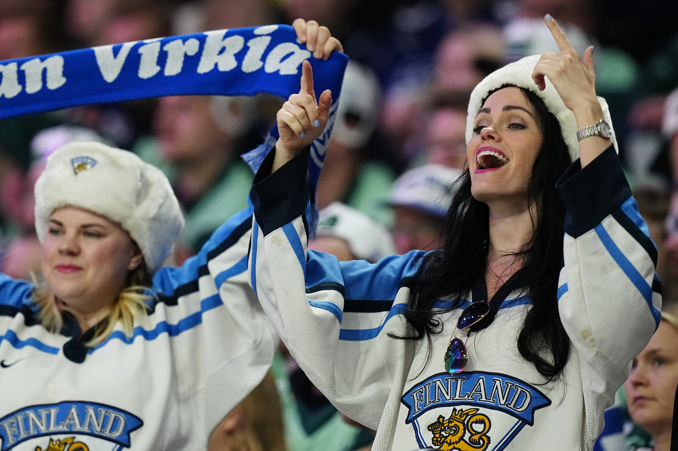 Finnarna är för åttonde gången rankat som världens lyckligaste land. Arkivbild. Foto: Pavel Golovkin/AP/TT