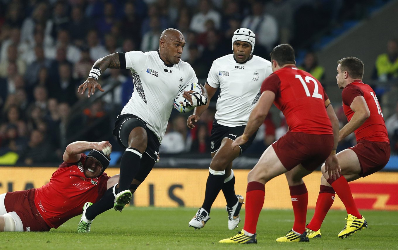 Nemani Nadolo är en känd rugbyspelare som deltagit i "Run-it-straight"-tävlingar. Foto: Alastair Grant/AP/TT