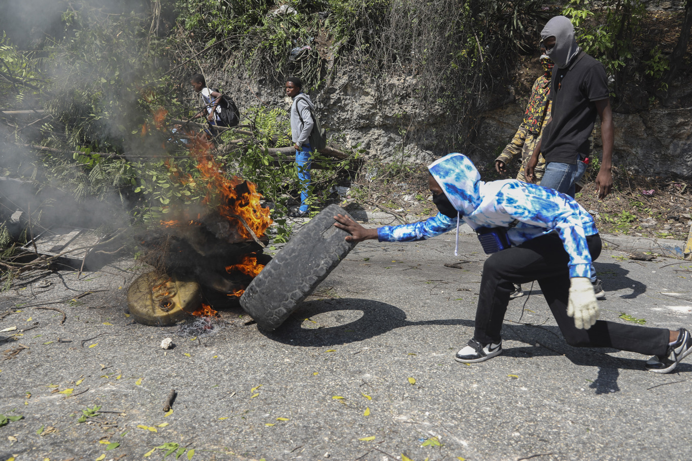 Gatuprotester i Port-au-prince i mars i år. Foto: Odelyn Joseph/AP/TT