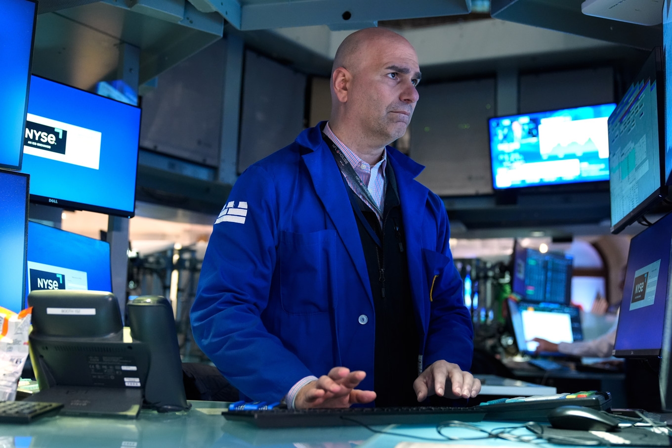 Förhållandevis muntert på Wall Street. Bilden är tagen 31 mars. Foto: Seth Wenig /AP/TT