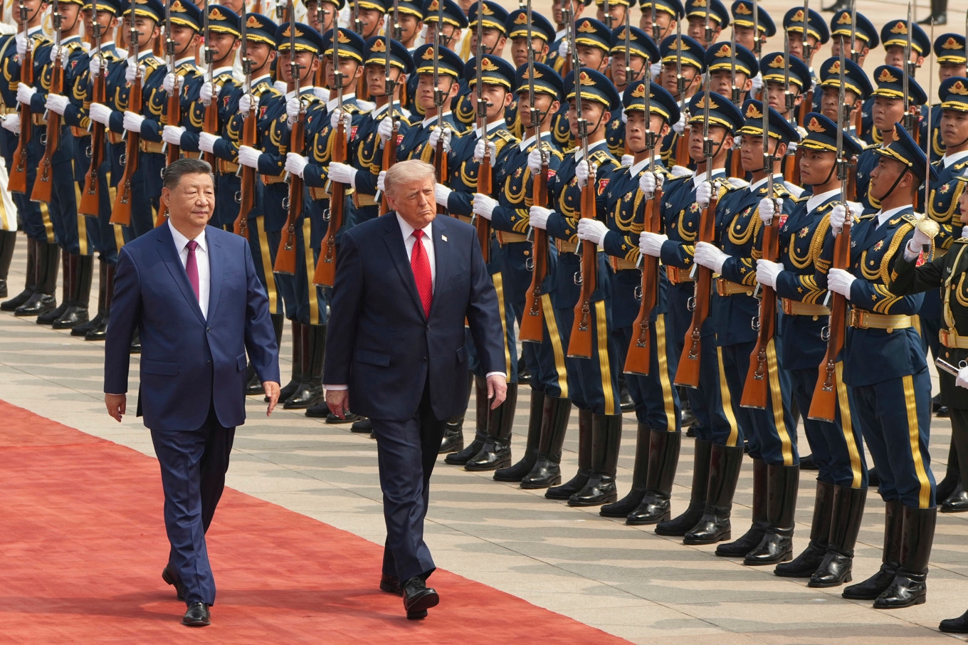 Kinas president Xi Jinping och USA:s president Donald Trump i Peking. Foto: Mark Schiefelbein /AP/TT