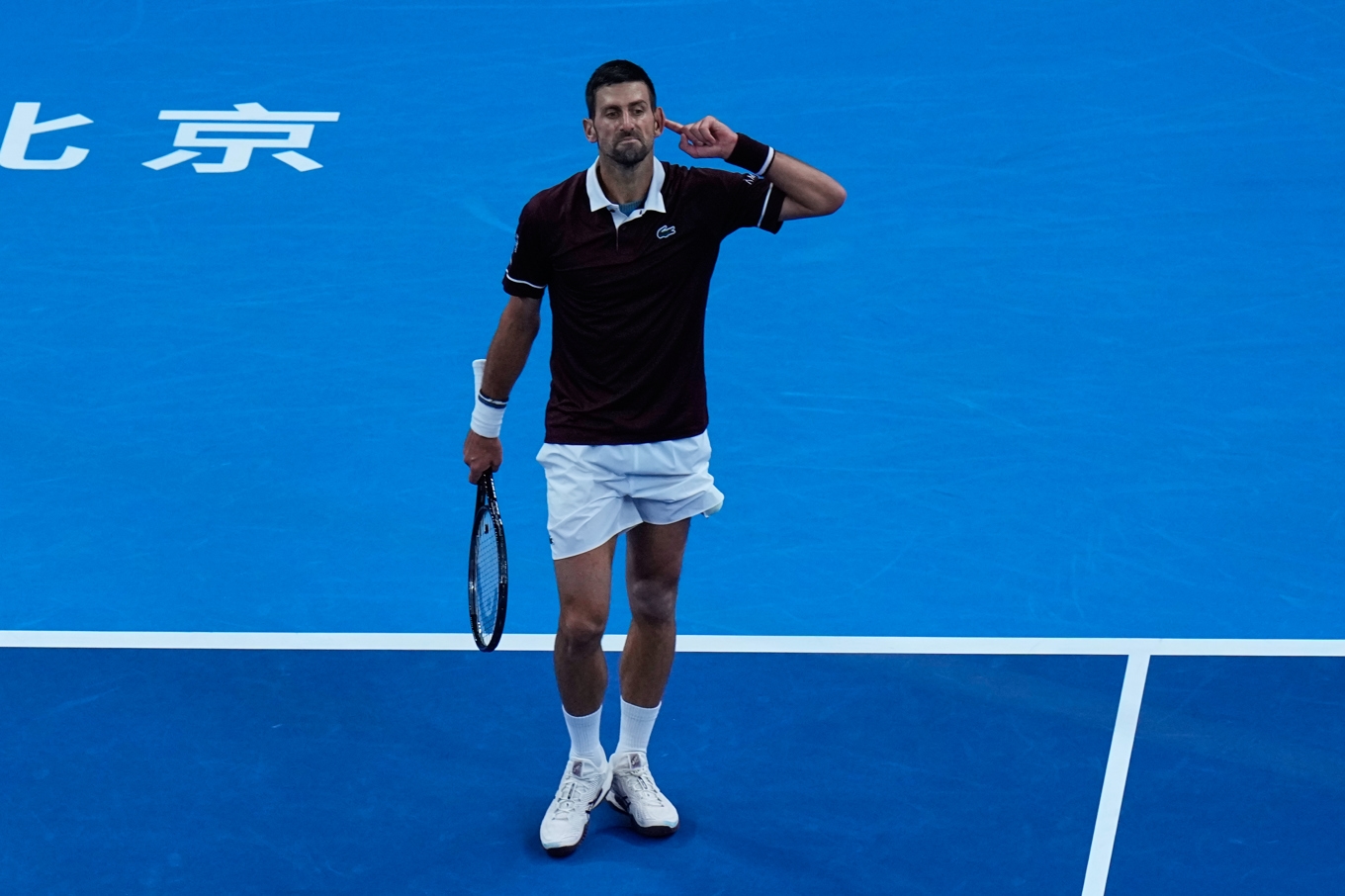 Novak Djokovic jublar under ATP-finalen i Peking. Foto: Andy Wong/AP/TT