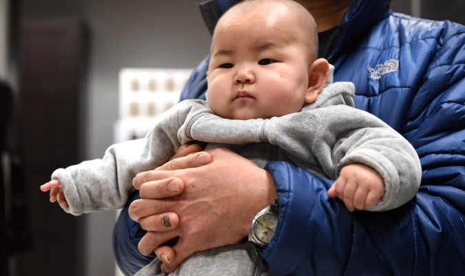 2015 går till historien som året då ettbarnspolitiken blev tvåbarnspolitik i Kina. (Foto: Goh Chai Hin/AFP/Getty Images)