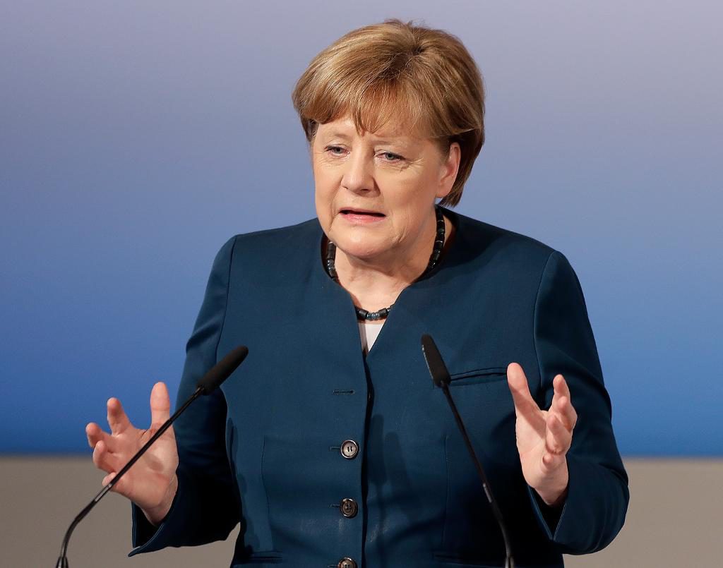 Tysklands förbundskansler Angela Merkel och hennes regering räknar med att IMF till slut ansluter sig till det tredje stödprogrammet till Grekland. Foto: Matthias Schrader AP/TT-arkivbild 420327h1024_1.jpg